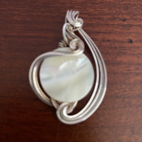 Handmade Mother of Pearl Pendant with Twisted Silver Wire Wrap Design - Picture 3 of 5
